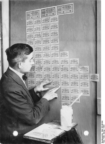 Wallpapering with Worthless Banknotes (1923)